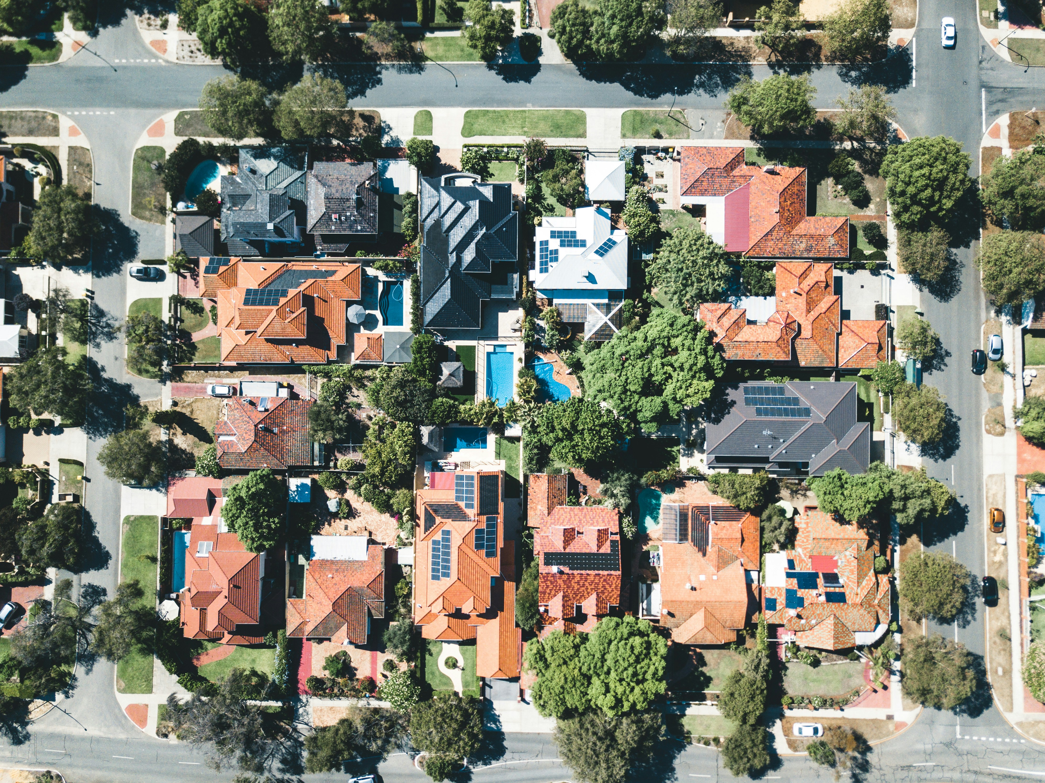 Aerial view of suburban properties demonstrating market insights and investment analysis